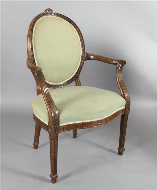 A set of eight Hepplewhite design mahogany elbow chairs, W.2ft 3in. H.3ft 2in.